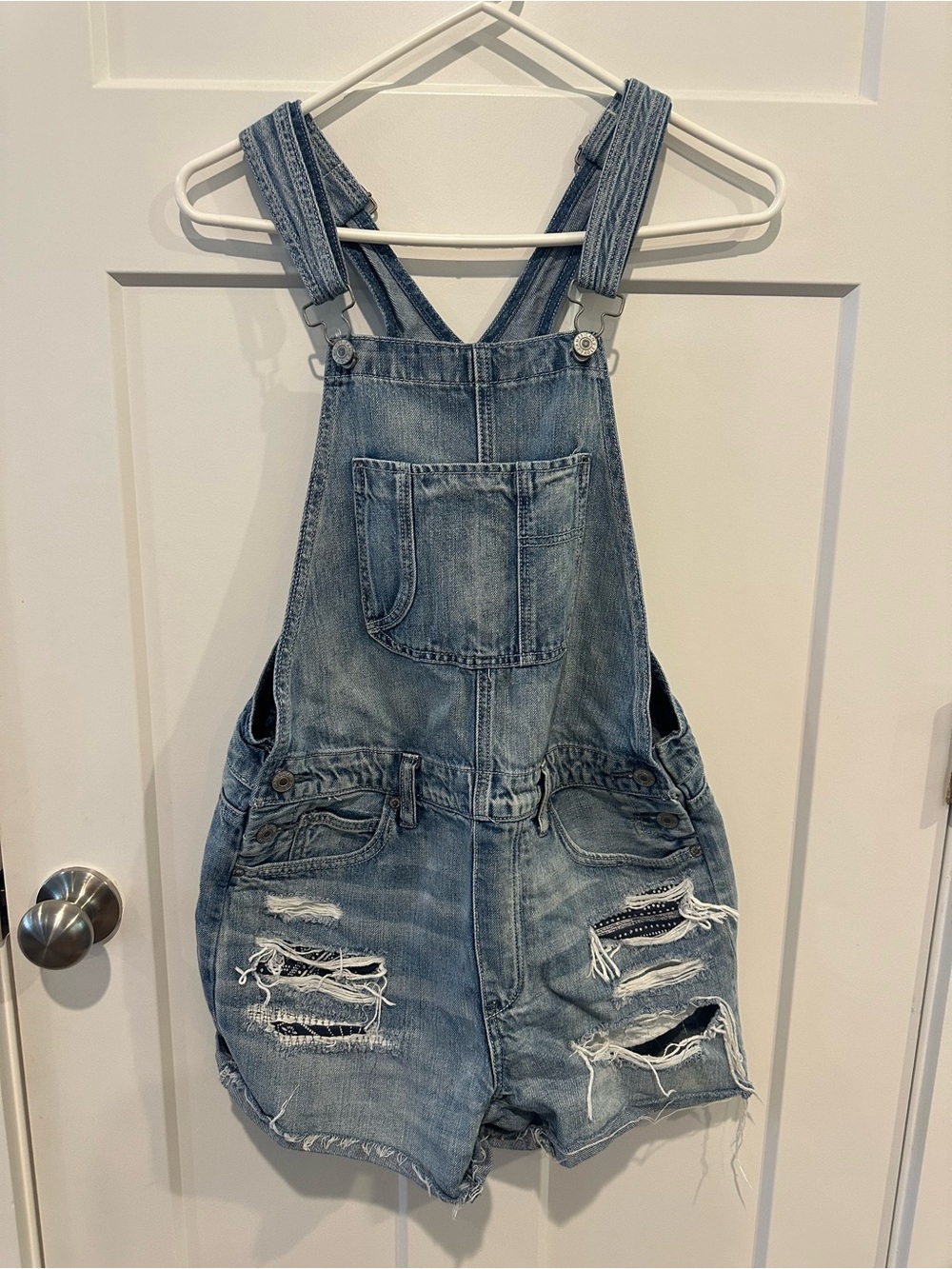 American Eagle Outfitters Light Blue Distressed Denim Short Overalls